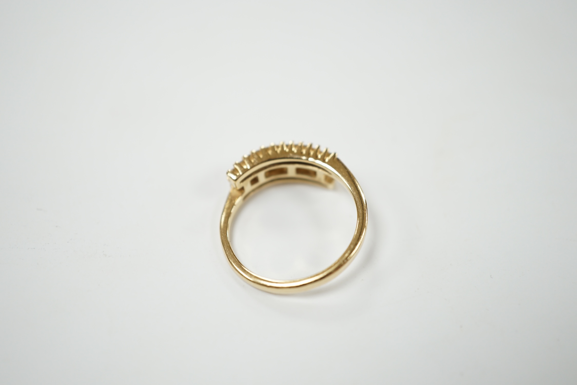 A modern 14k and diamond cluster set three row ring, size N, gross weight 3.1 grams. Condition - fair